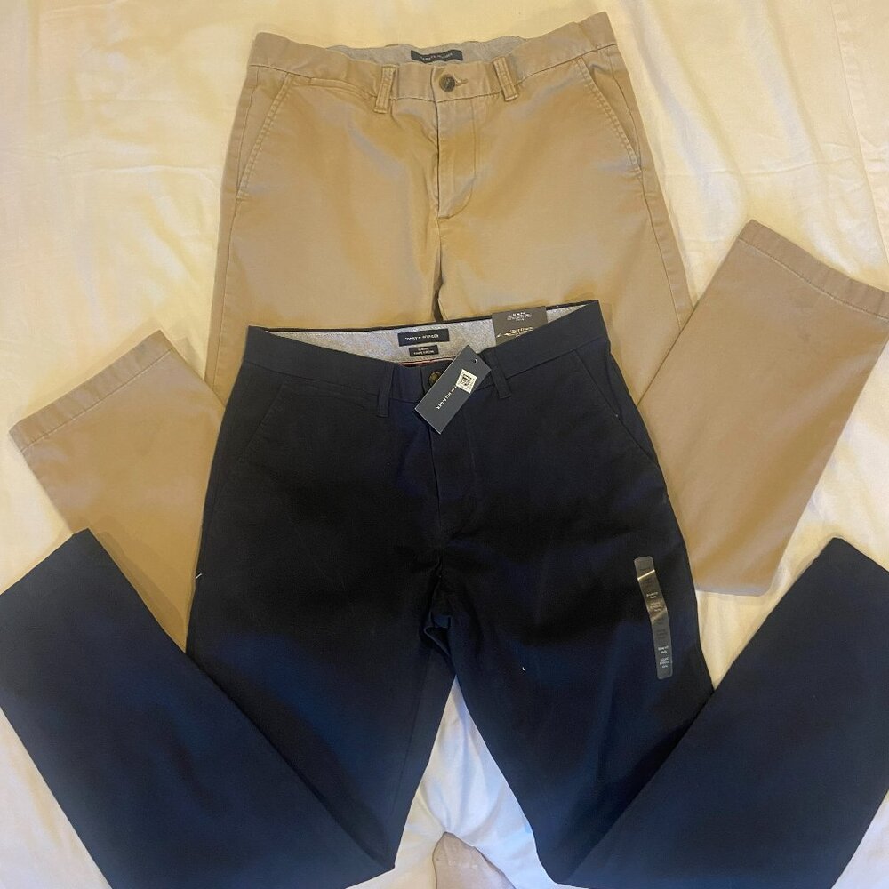 2 pairs men's pants: Tommy Hilfiger and Under Armour. Both 32/32. Navy and Tan.